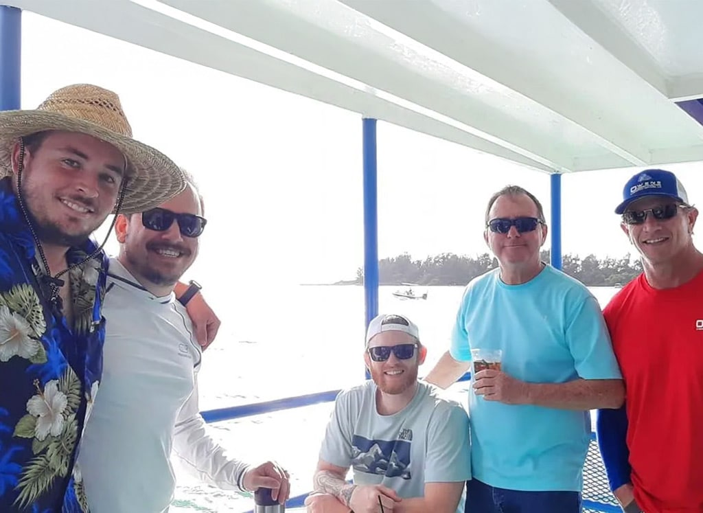 Father's and sons on a boat for a father's day cruise on Sarasota Bay