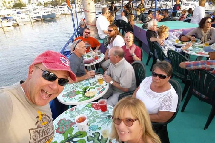 a group of people sitting at a table
