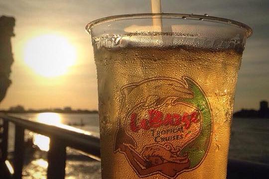 a glass of beer on a table
