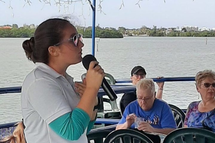 a group of people sitting on a bench
