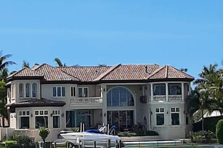 a small house in a body of water