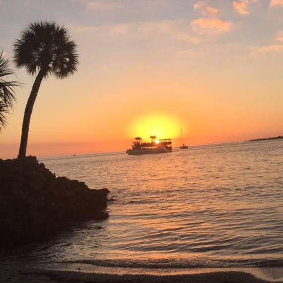 a sunset over a body of water