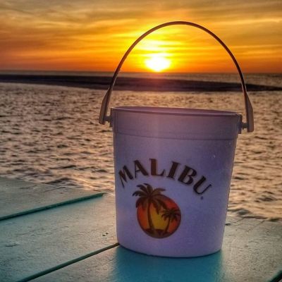 a sunset over a body of water