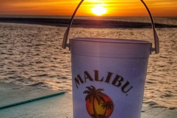 a sunset over a body of water