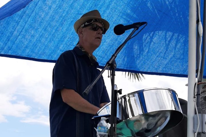 a man in a blue suitcase