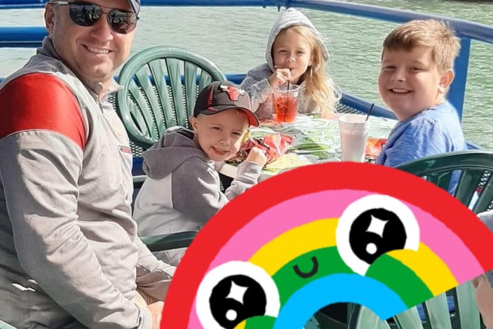 a group of people sitting at a park